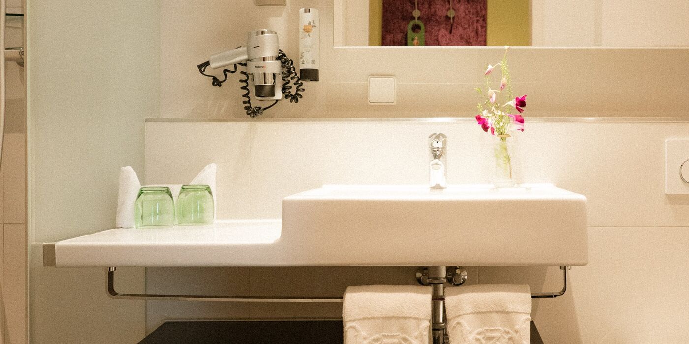 Badezimmer im Hotel Capricorno Wien