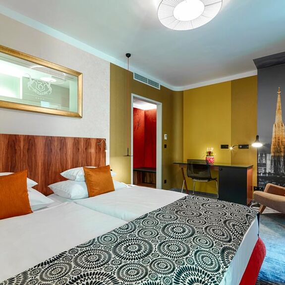 Hotelzimmer mit Balkon im 4-Sterne Hotel Capricorno in Wien