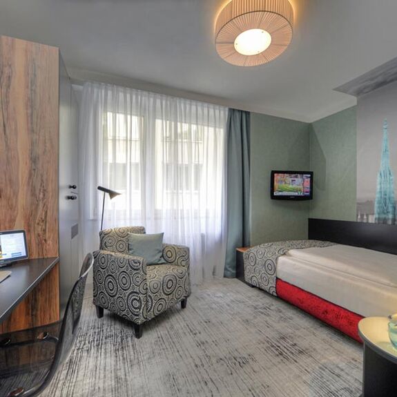 Modern single room at Hotel Capricorno